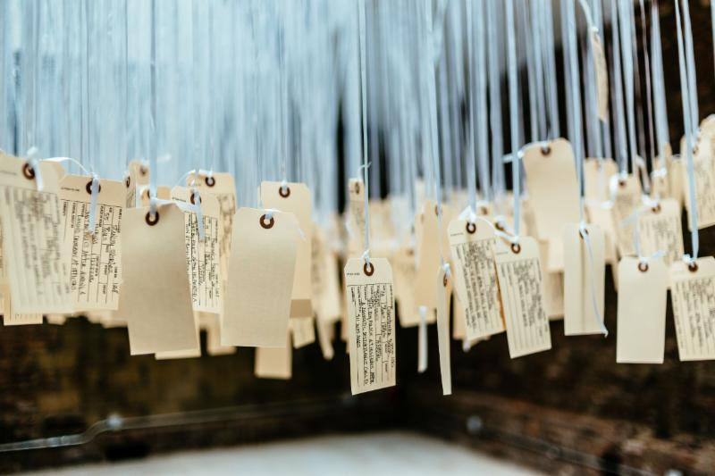 “....and counting” by Ann Lewis (1,093 toe tags documenting every police-related death in 2016)
